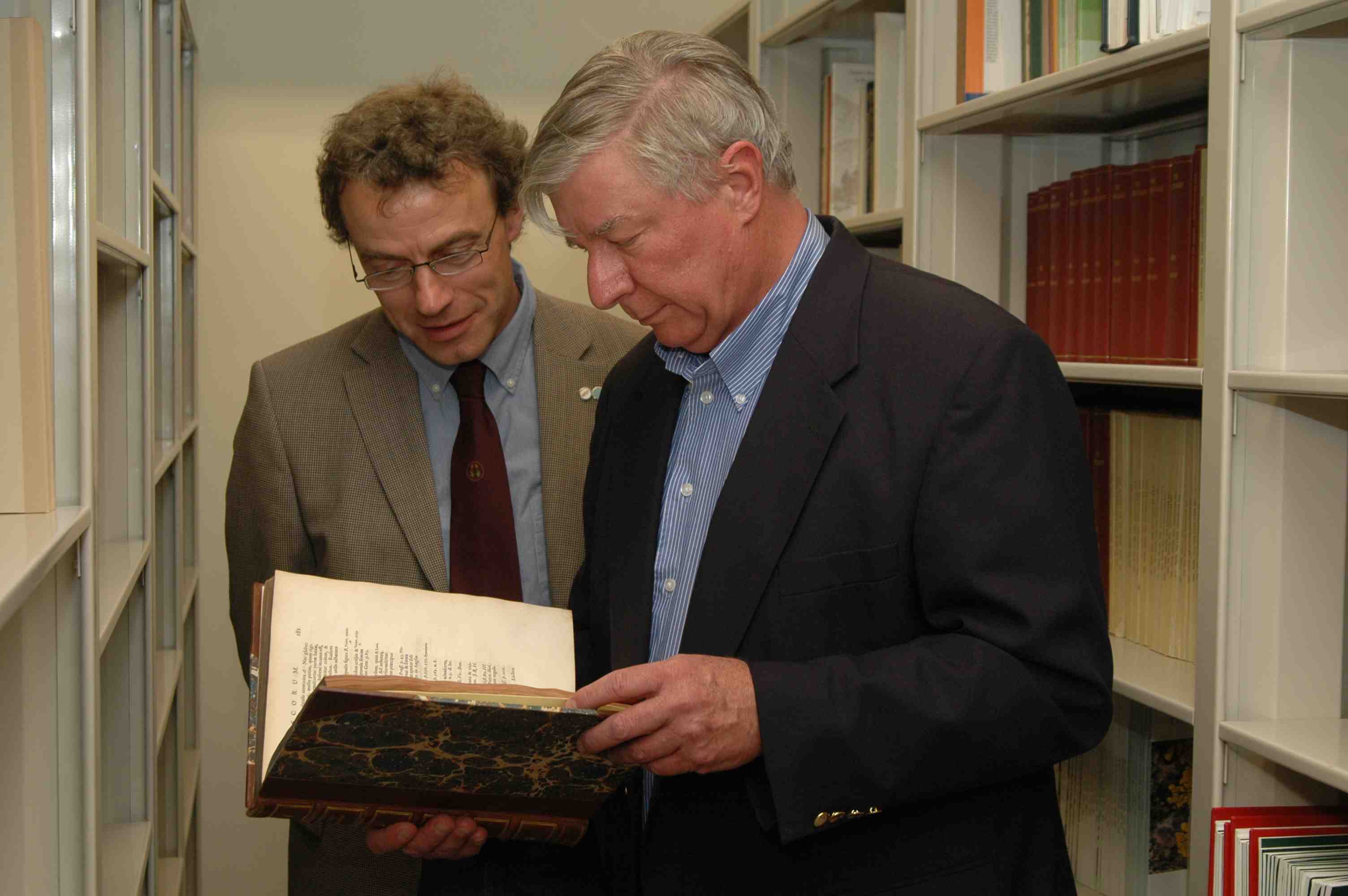 Storrs L. Olson and B. Goffinet examining Dillenius' 1741 book "History Muscorum"